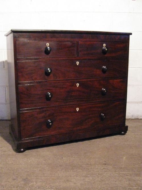 Antique dark wood chest on sale of drawers