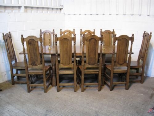solid oak jacobean style 10 seat extending dining table chairs
