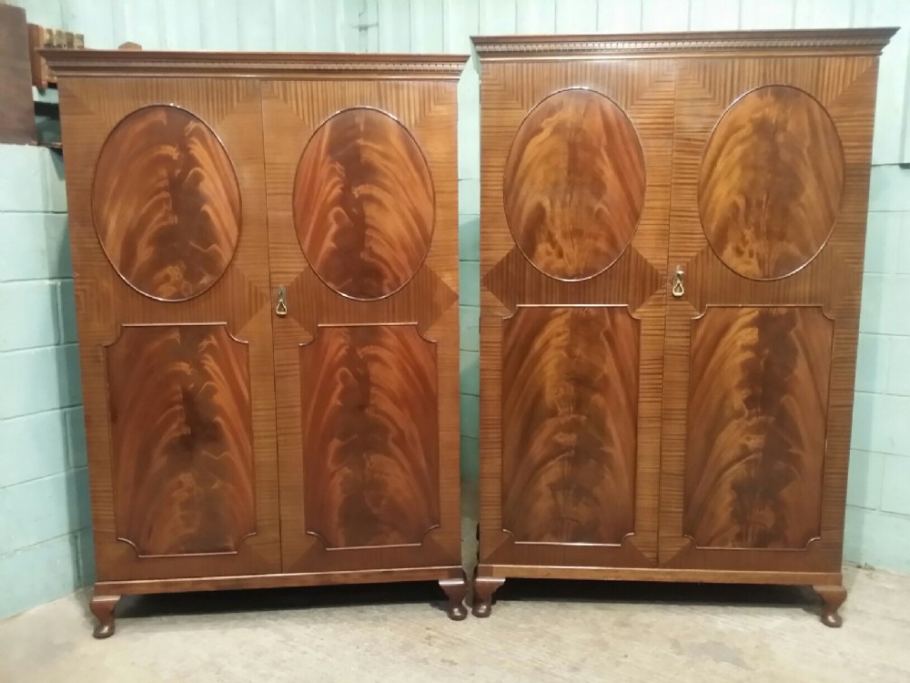 pair 1920's ladies and gents flamed mahogany wardrobes