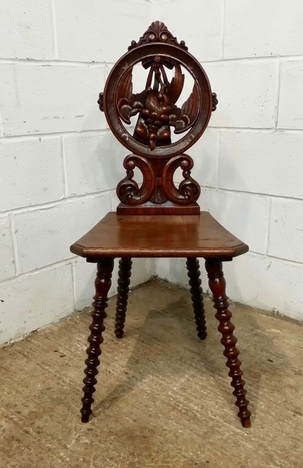 antique 19th century black forest oak hall chair with hanging pheasant c1880