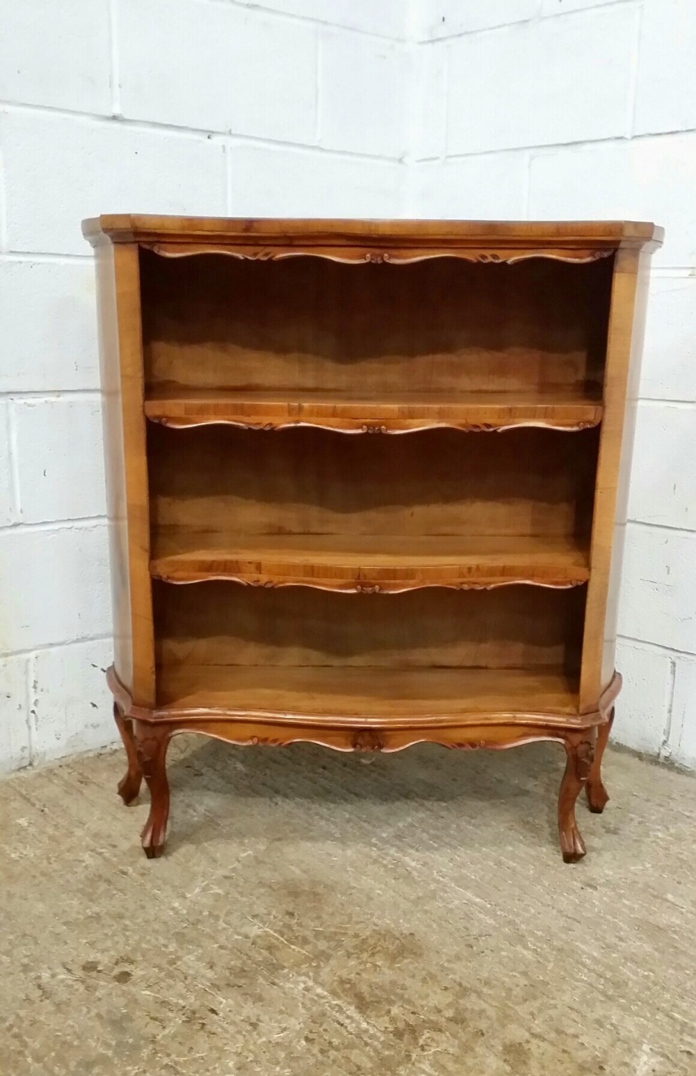 antique french walnut serpentine shaped open bookcase c1920