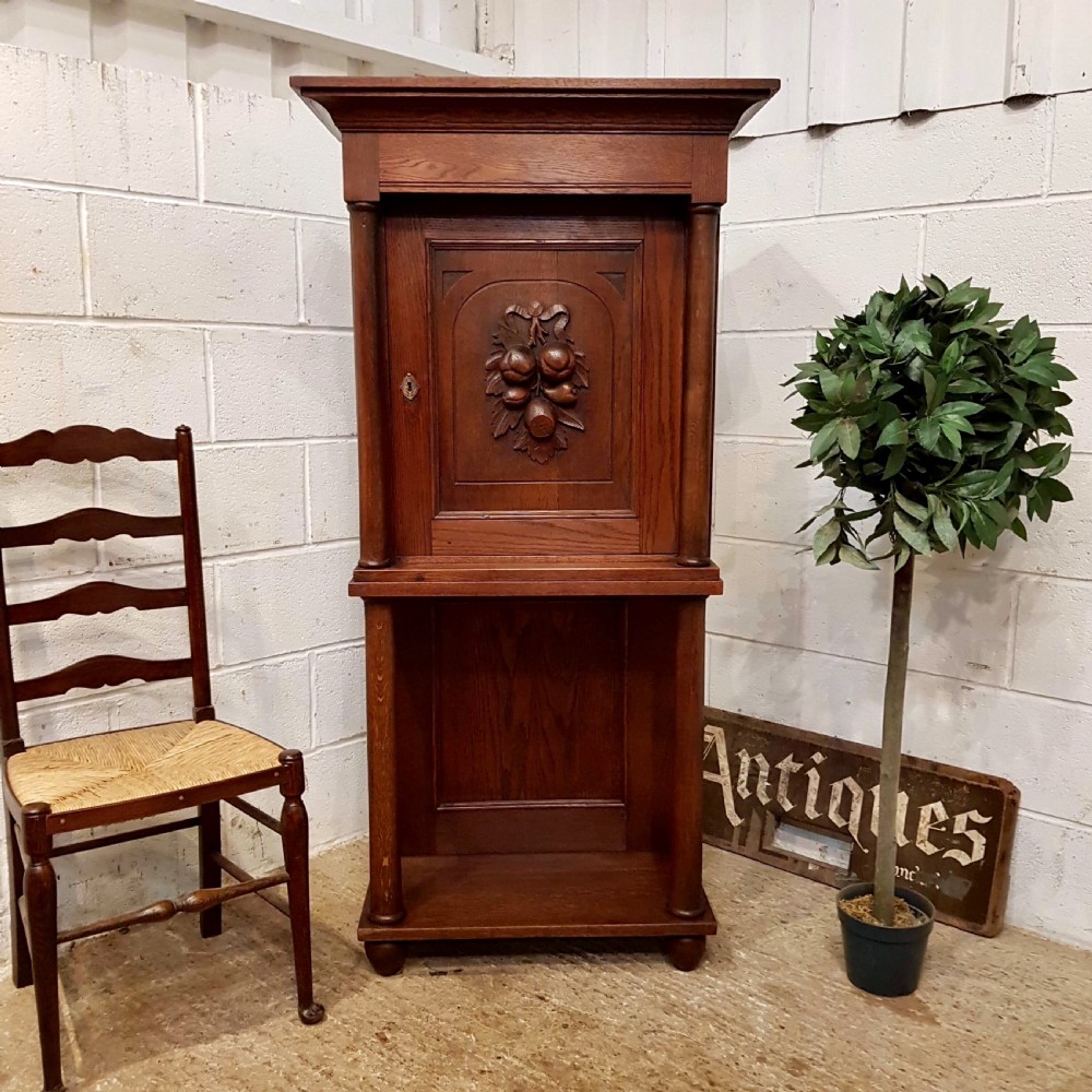antique flemish oak cupboard on stand c1900