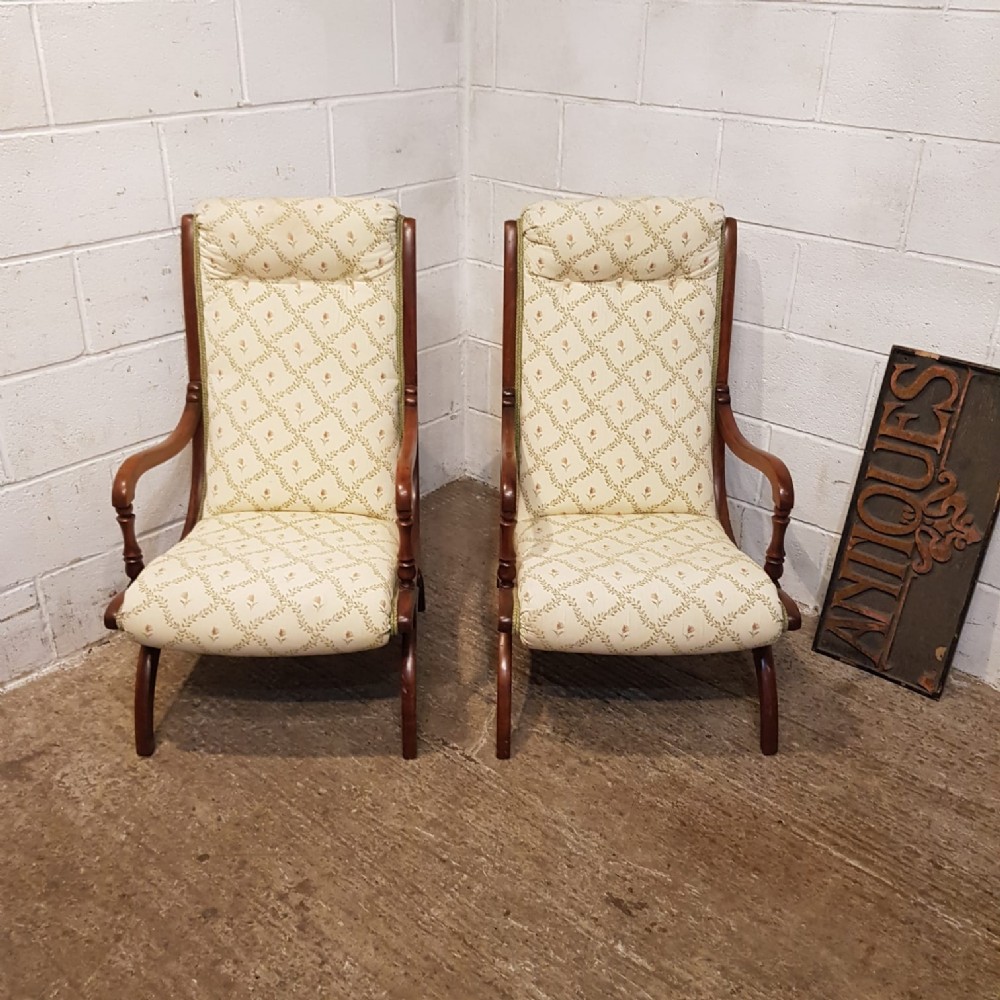 an antique pair of edwardian x framed chairs c1920