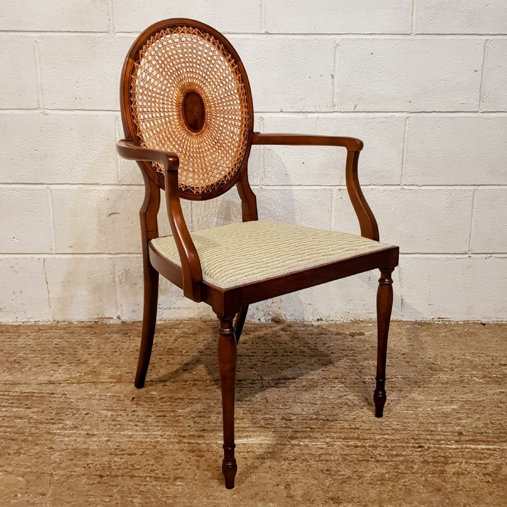 an antique bergere split cane back chair c1920