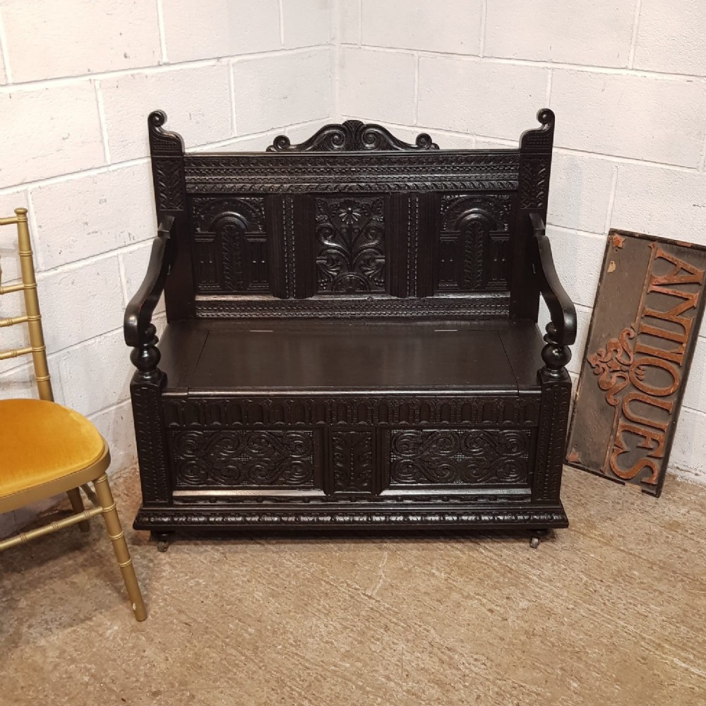an antique victorian carved oak box hall bench c1890