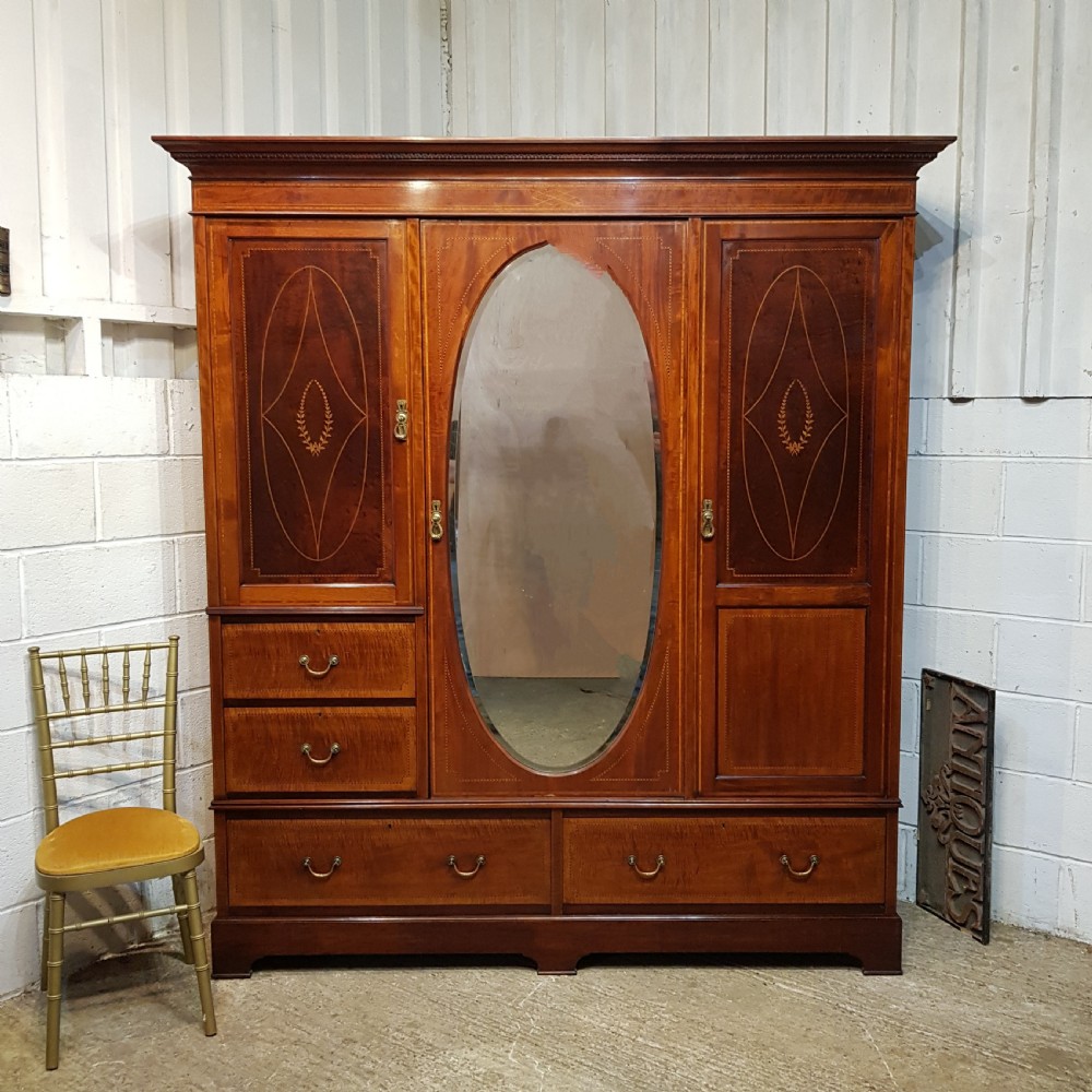 an edwardian mahogany triple wardrobe c1900