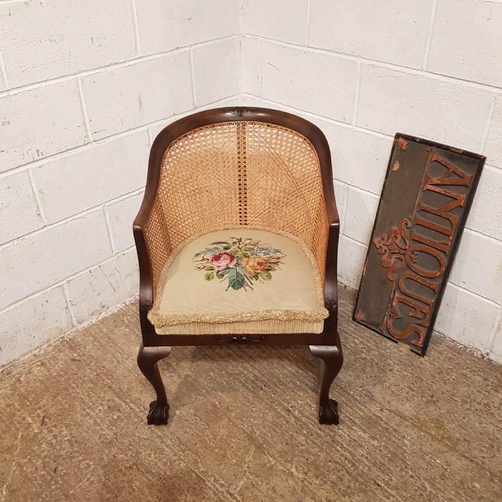 a denby spinks mahogany framed bergere backed tub chair c1920