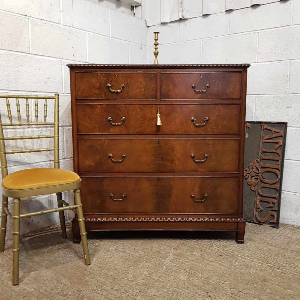 AN ANTIQUE EDWARDIAN MAHOGANY FOUR HEIGHT CHEST OF DRAWERS C1900 an antique edwardian mahogany four height chest of drawers c1900