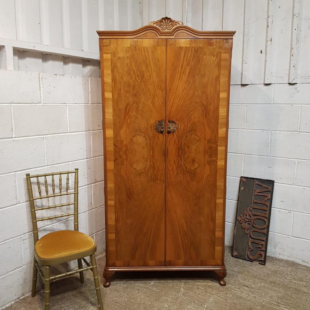 A BURR WALNUT FITTED WARDROBE C1920 a burr walnut fitted wardrobe c1920