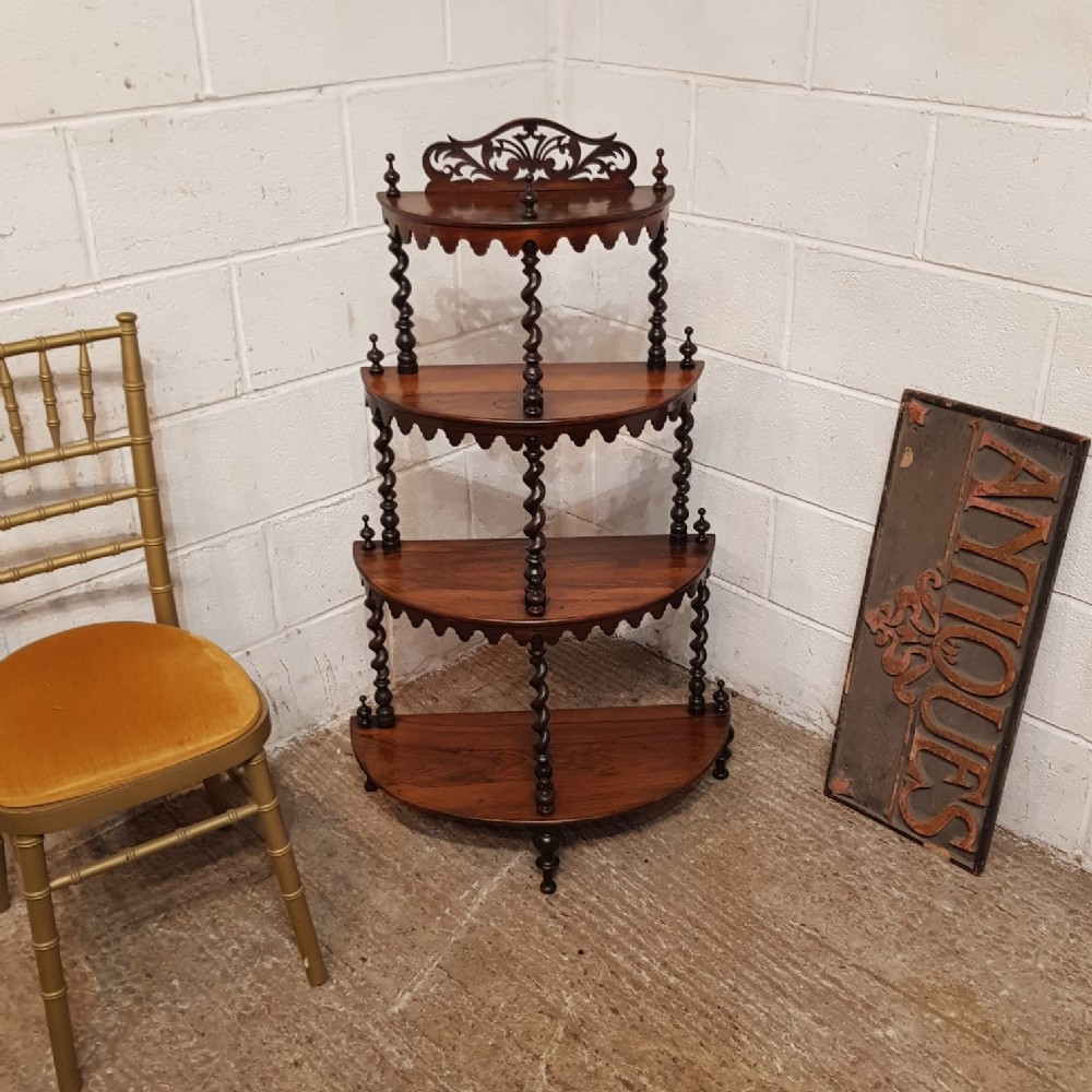 A VICTORIAN ROSEWOOD DEMI LUNE SHAPED WOT NOT C1880 a victorian rosewood demi lune shaped wot not c1880