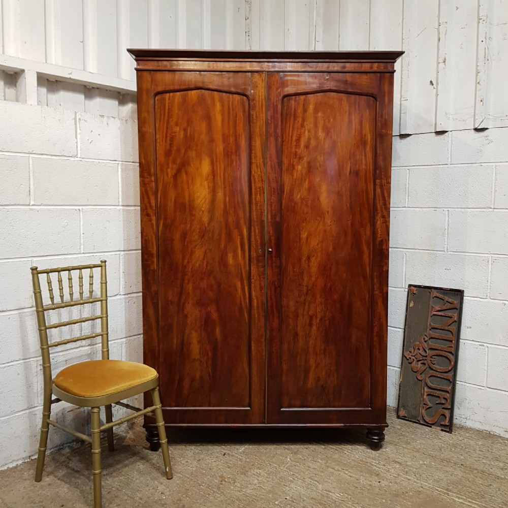 a regency mahogany double wardrobe c1810