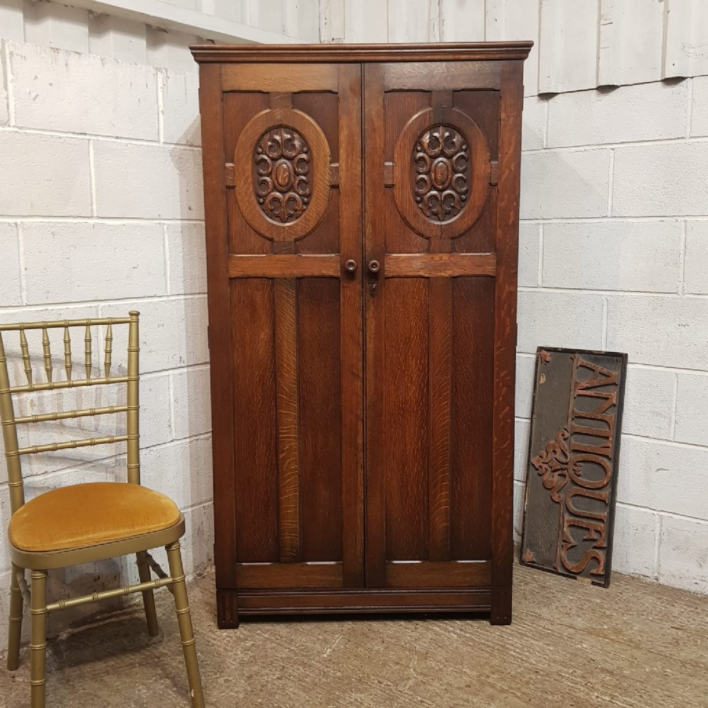 an antique small oak wardrobe c1920