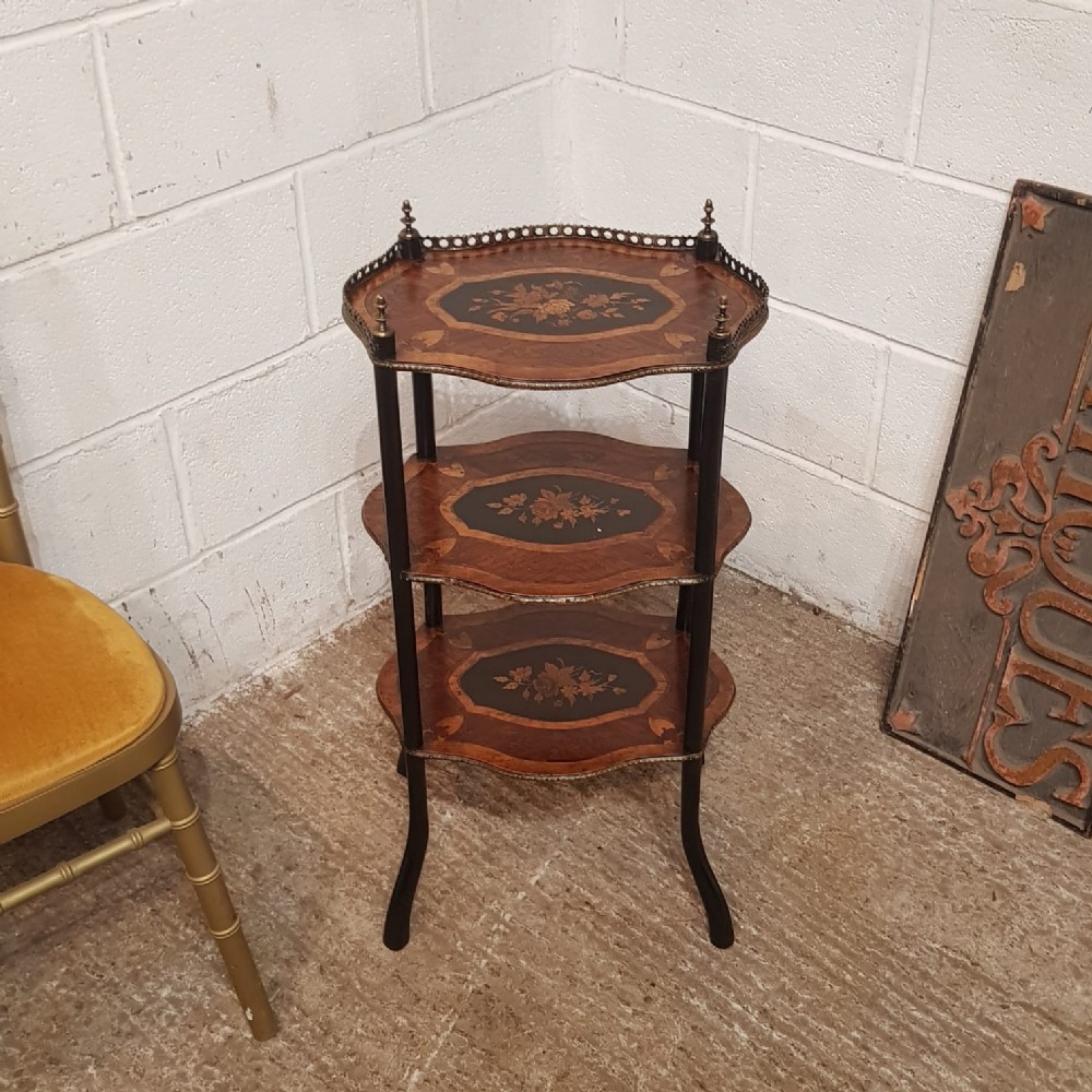 a victorian walnut and ebony 3 tier etagere c1880