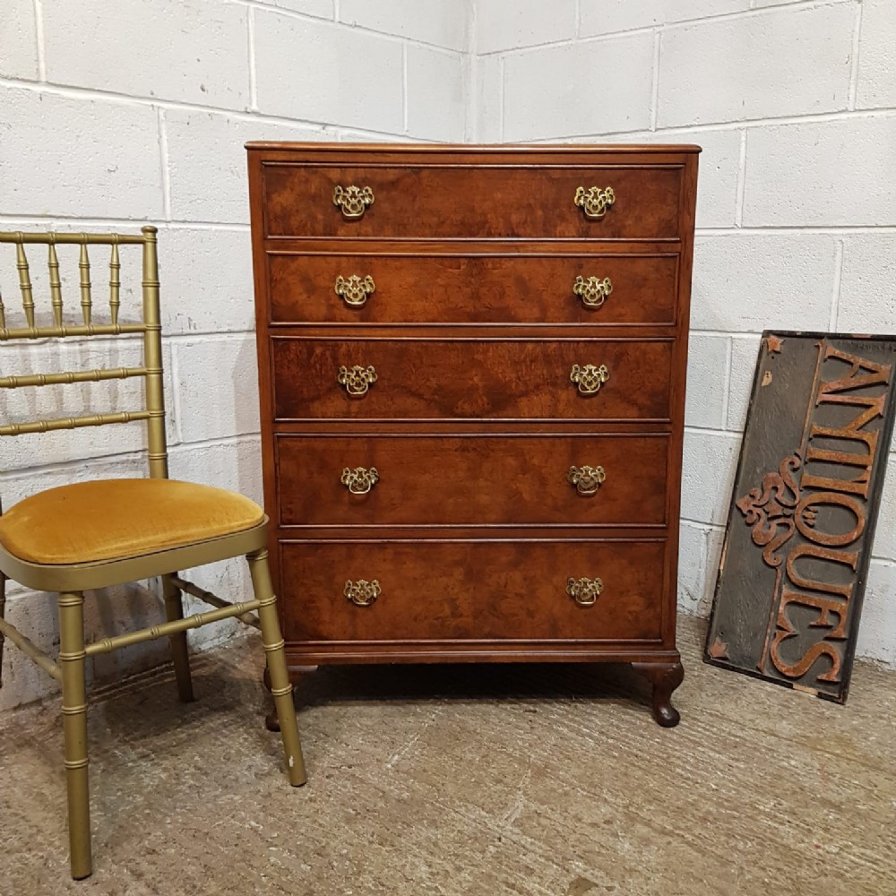 a burr walnut five height chest of drawers c1920