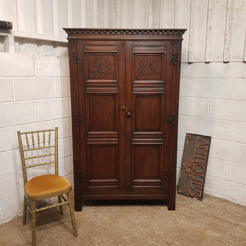 an edwardian carved oak double wardrobe c1910