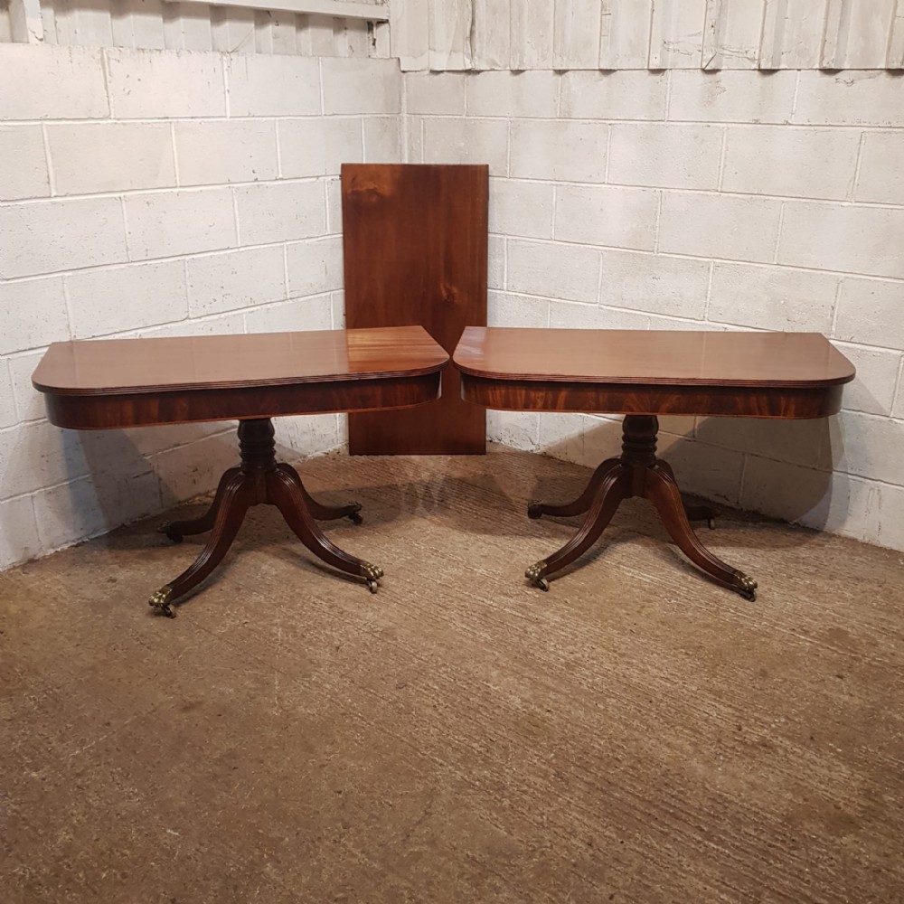 a regency mahogany twin pillar dining table c1800 seats 8
