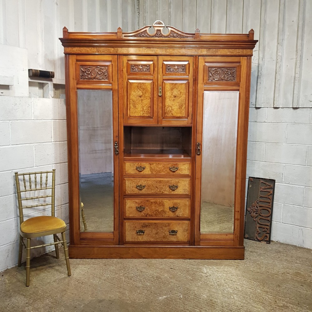 a late victorian walnut and burr walnut triple wardrobe c1890