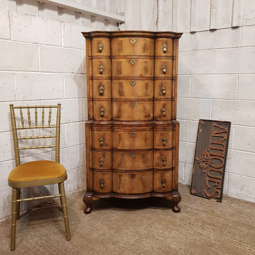 a queen anne style burr walnut serpentine fronted chest on chest c1900