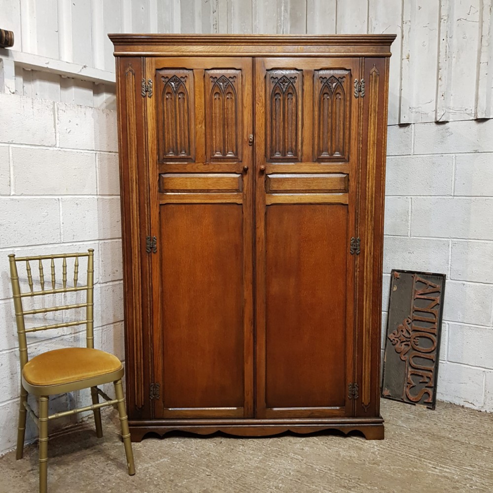 an antique oak double wardrobe c1920