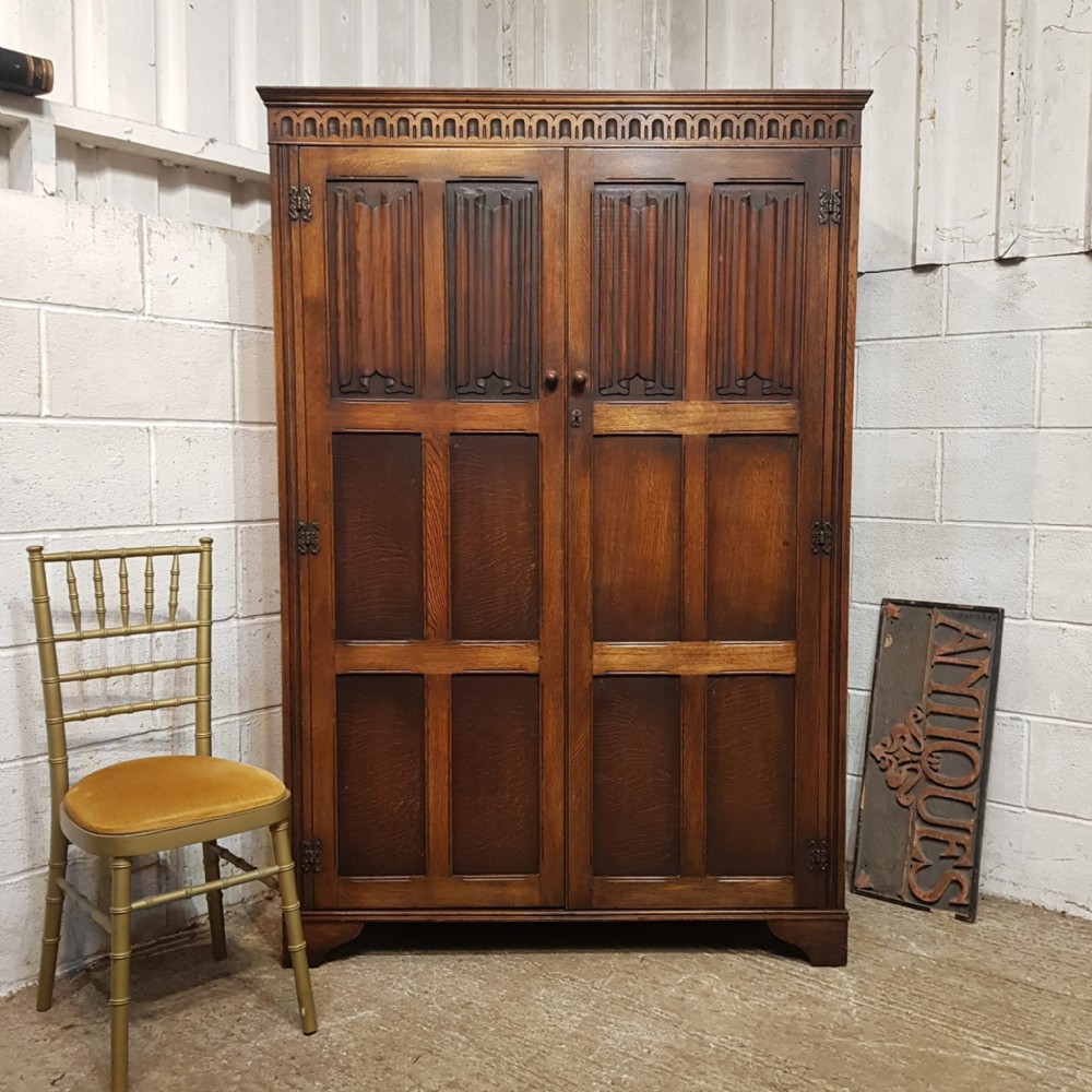 an antique oak double wardrobe c1920