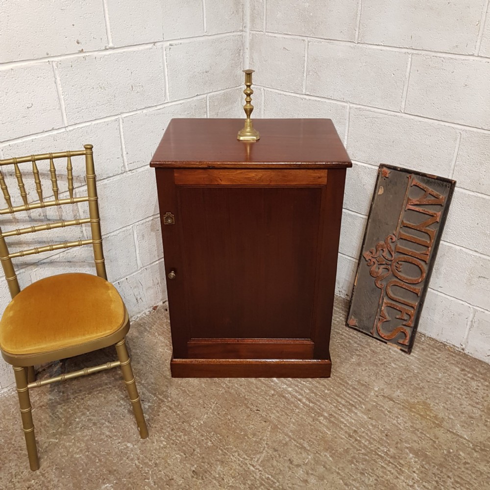 a mahogany regency cupboard c1810