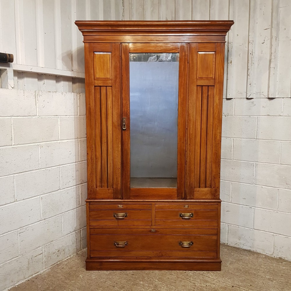 an edwardian single wardrobe in walnut c1900