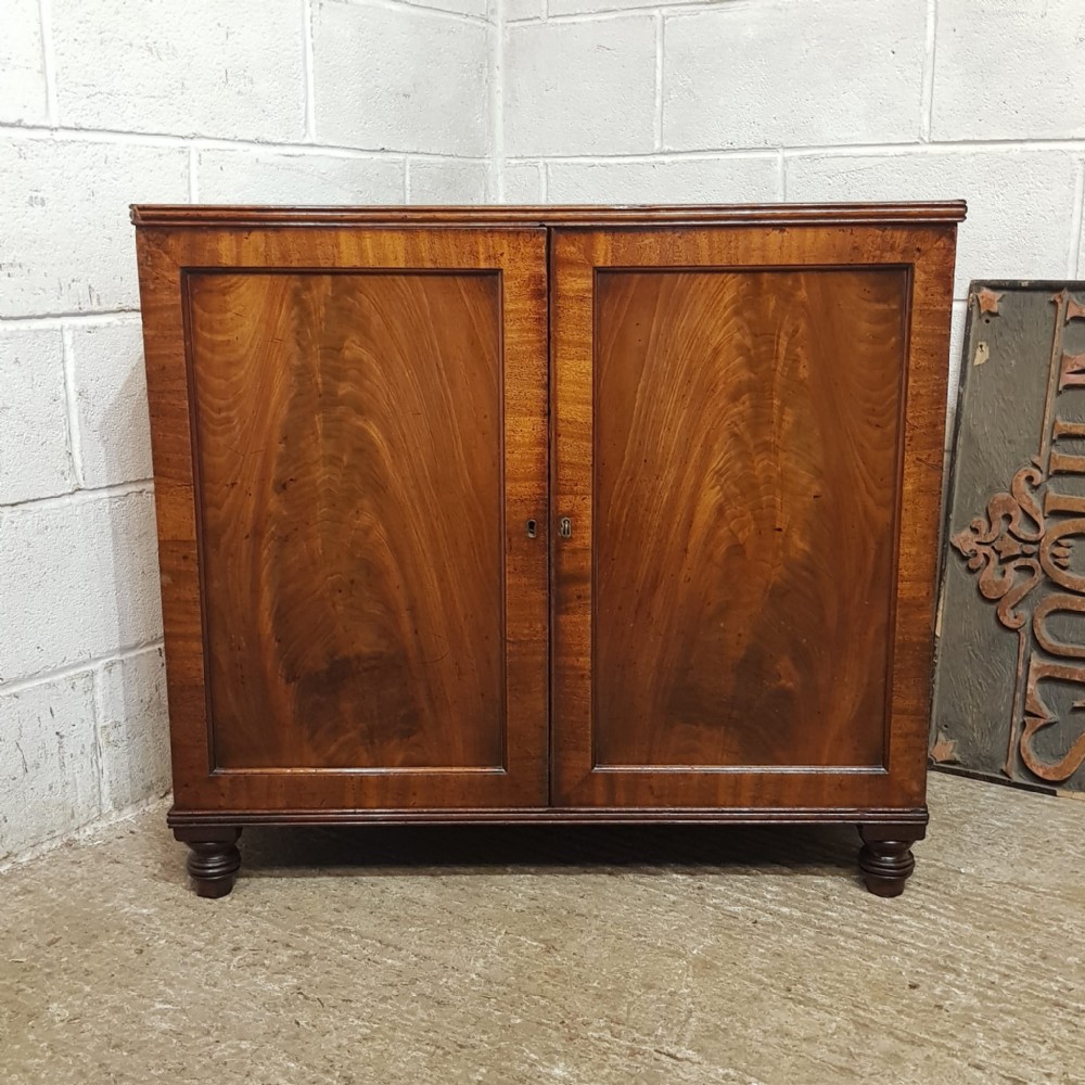 a regency mahogany low cupboard c1820