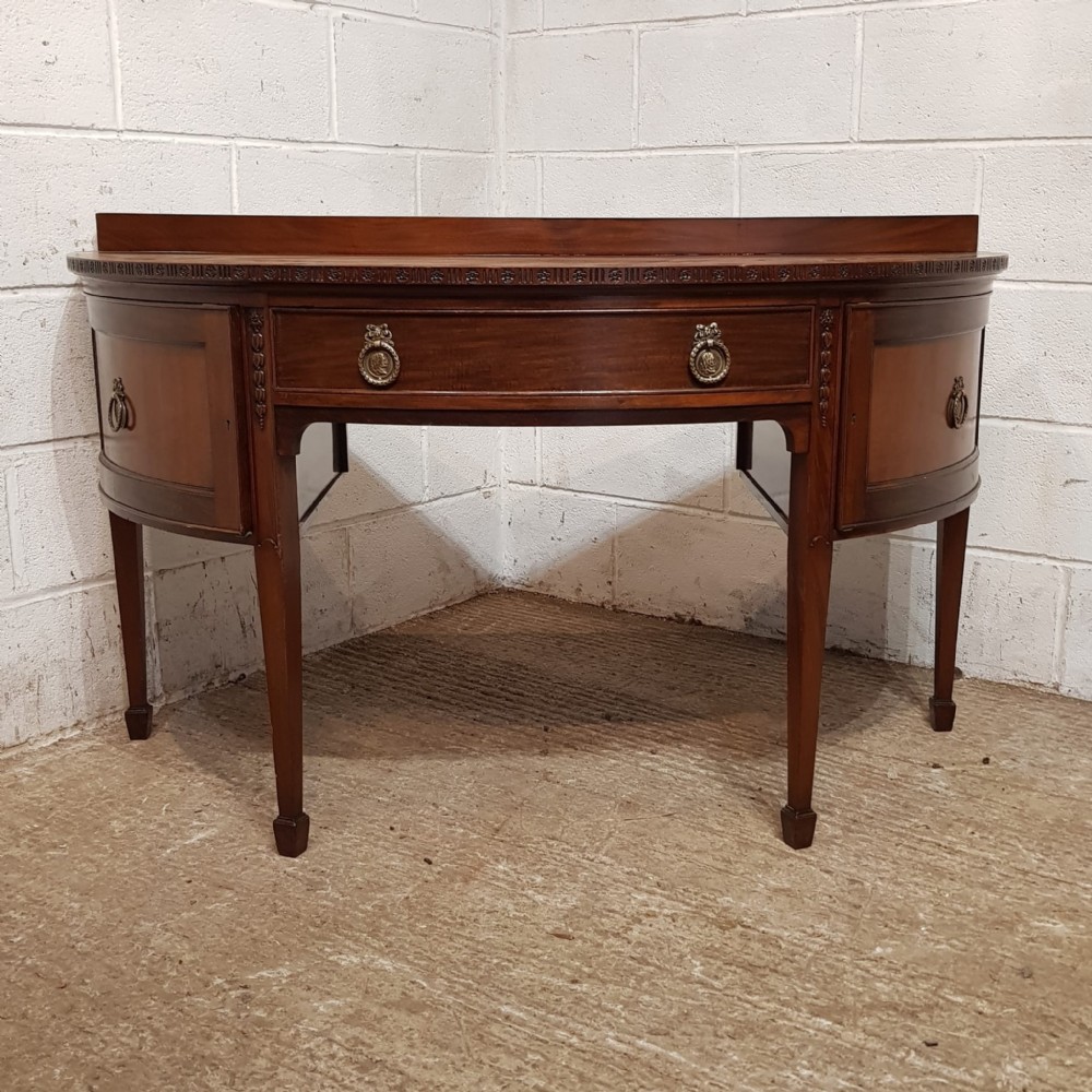 a mahogany demi lune side desk c1900