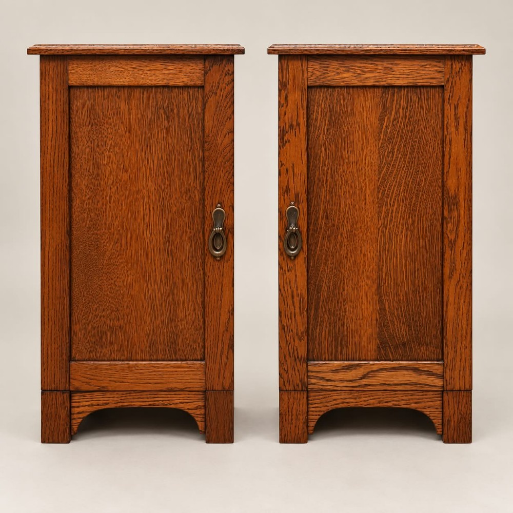 a pair of oak bedside cabinets c1920