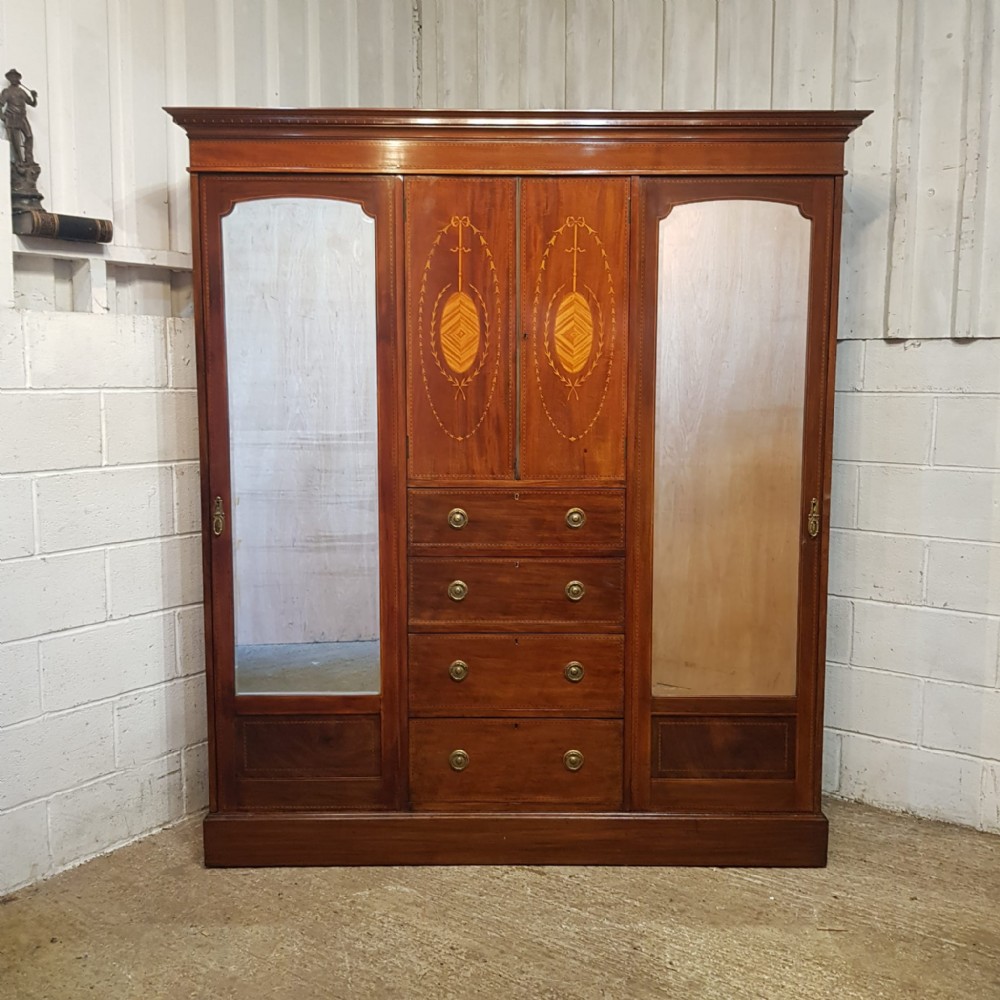 an edwardian mahogany triple wardrobe c1900